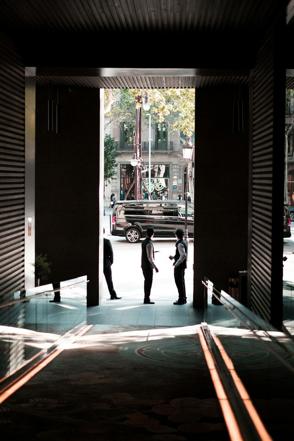 Luxury hotel doormen at the entrance, hospitality management